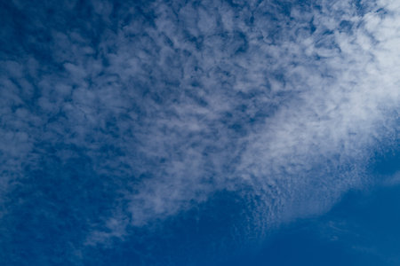 Background with cloudy skies. Cumulus clouds in sky. Blue cloudscape. Sky background. Cloudy sky...