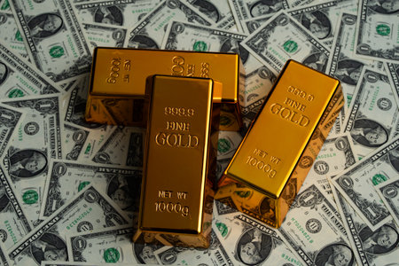 Money dollars vs gold bar. Precious metals. Saving finance in gold bar. Dollars vs gold bar. Saving money background. Dollar bills vs gold bars. Banking and savings. Golden metal.の写真素材