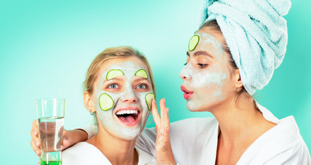 Two beauty girls friends. Woman beauty treatment. Woman beauty mask. Skin cosmetics spa. Skin...