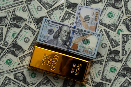 Gold bar vs dollars bills. Saving finance. Dollars vs gold bar. Saving money background. Dollar...