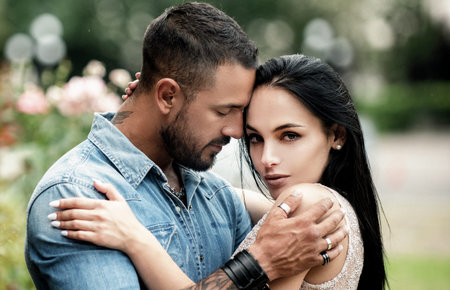 Trust in love. Enjoying the company of each other. Sensual woman and man embracing. Lovers hugging....