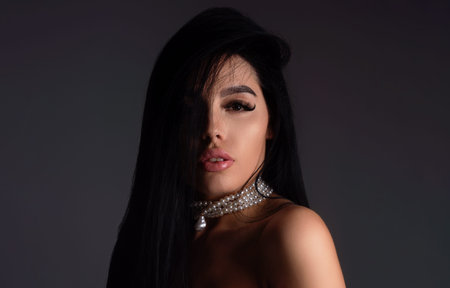 Close-up portrait of young sensual woman. Portrait of sensual beautiful model. Beauty woman. Stylish sensual woman face. Young sexy lady. Nature woman face. Portrait of sensual young girl.の写真素材