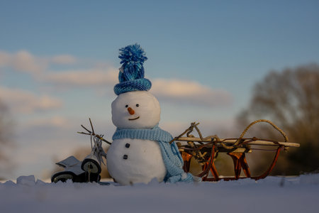 Snowman winter background. Snow holiday scene. Festive snowman with scarf. Snowy design. Happy...