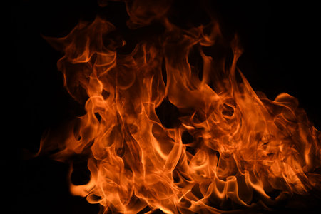 Fire flames isolated on black background. Fire burn flame isolated, flaming burning art design...