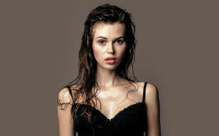 Beauty woman face girl portrait. Model, beautiful female face. Woman looking sensual. Gorgeous charming lady. Fashion portrait. Natural cosmetics for young woman. Beauty girl. Pretty woman.の写真素材