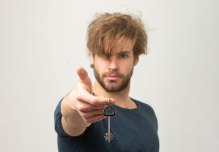 Key concept. Keys to success. Crazy homeowner. Funny guy got the key. Funny security concept with...
