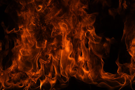 Fire blaze flames on black background. Fire burn flame isolated, abstract texture. Flaming explosion...