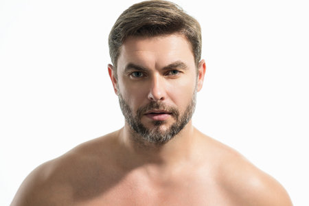 Close up face of handsome man. Portrait of shirtless man for skincare and beauty concepts. Handsome...