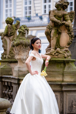 A Japanese bride in white wedding dress at a dream wedding. The bride looked beautiful on wedding day. A beauty bride, perfect wedding. Elegance young bride. The brides beauty.の写真素材
