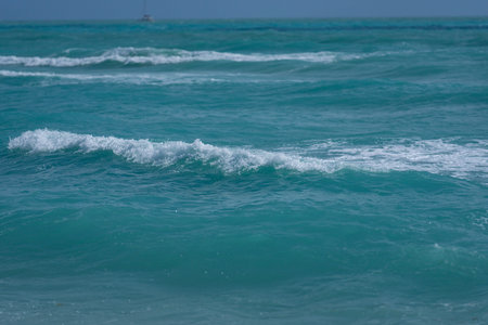 Turquoise sea water wave motion. Summer beach. Calm sea. Beauty sky and waves on beach. Beautiful...