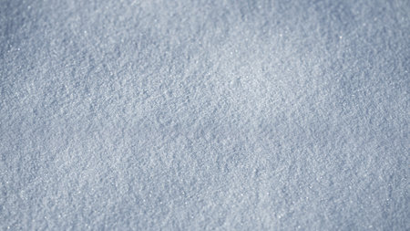 Snow covers the background. Snow shows the beauty of winter. Snow looks bright and white. Snow stays frozen all day. Snowy pattern. Snowflake falls. Cold and icy design.の写真素材