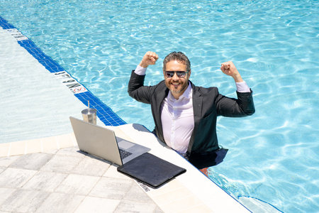 Success businessman. Business success. Successful office worker in suit in water. Successful...