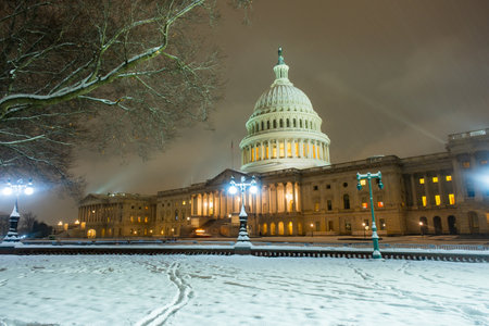USA Capitol in winter. Congress. American Capitol Building in snow. Washington city Capitol. United States Capital. Washington, US landmark. Supreme Court. Washington D.C. monument. Washington city.の写真素材