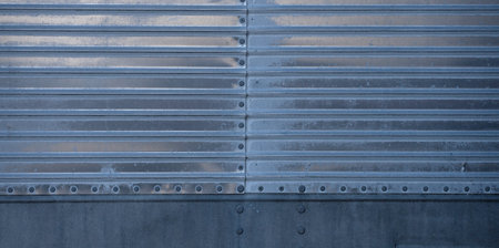 Metal background texture. Steel industrial surface. Rusted metal design. Dirty and scratched panel. Metallic industrial backdrop. Stained stainless steel. Game-inspired metal texture. Military-style metal sheet.の写真素材