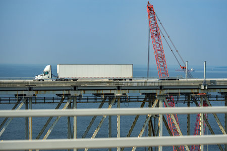 Truck on the road. Lorry transporting. Cargo trailer. Logistics truck, international shipment. Truck...