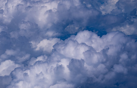 Stormy sky with dark clouds. Dramatic cloudscape. Background of storm clouds. Moody sky with heavy clouds. Stormy cloud. Sky before the storm. Sky after the rain. Scattered clouds. Stormy skies.の写真素材