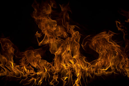 Fire flame burning and fire glowing on black background.