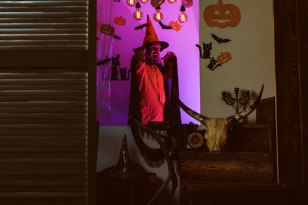 31 october. Magic, enchantment, witchcraft. Make up and scary concept for man. Celebration party.の写真素材