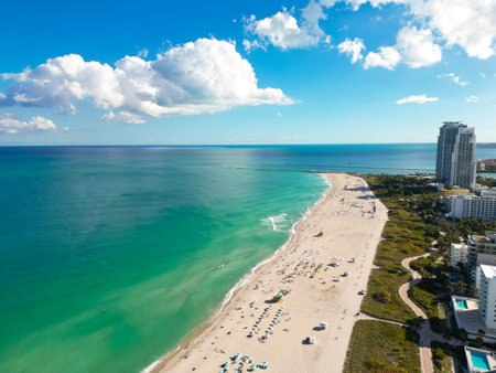 Miami Beach under the summer sky with clouds. South coastal in Miami Beach. Skyscrapers in Miami Beach, aerial panorama. Travel dreams in Florida. Miami Beach landscape.の写真素材
