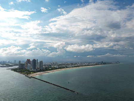 Aerial view of South Pointe Park. Miami Beach. Florida. USA. Summer holidays in Miami Beach. Aerial panoramic view of the city of Miami, buildings, marina, yachts and luxurious apartments.の写真素材
