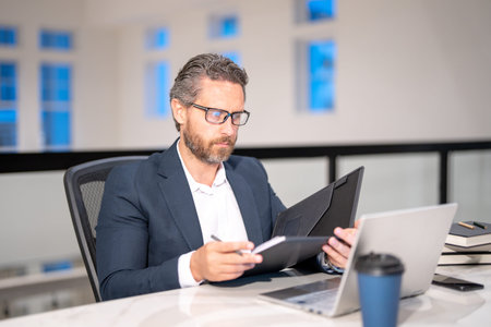 Business man entrepreneur startup owner in modern office. Occupation person in work space. Business...
