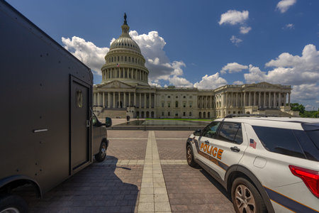 Police car in Washington DC. Police near Congress. Capitol Hill security. American police. Historic Capitol dome and police.の写真素材