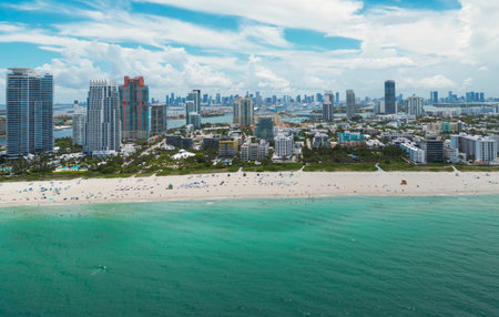 Miami cityscape with luxury skyscrapers and ocean. Panoramic drone view of Miamis famous skyline....