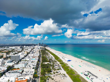 Miami skyline on blue sky with clouds. South beach coastal in Miami. Skyscrapers in Miami, aerial panorama. Travel dreams in Florida. Miami cityscape.の写真素材
