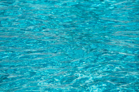 Blue ripped water in swimming pool, water pool texture and surface water backgraund.の写真素材
