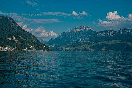 Alps mountains and like in Switzerland. Alps nature in Switzerland. Swiss Alps. Panoramic view of idyllic mountain scenery in the Alps. Nature of Swiss lakes. Switzerland scenic landscape.の写真素材