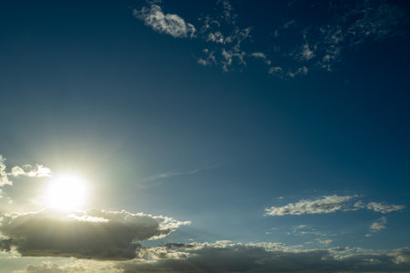 Sunset or sunrise. Dramatic majestic scenery sunset. Sky with clouds in sunset sky light background....
