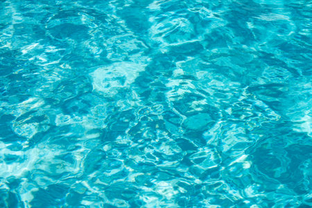 Blue ripped water in swimming pool, water pool texture and surface water backgraund.の写真素材