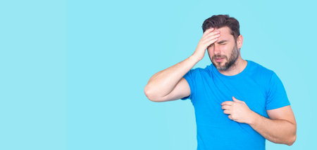 Worried Man with expression of anxiety. Worried Man experiencing issues, worry, frustration and emotional stress. Worried man feeling stress. Worried expression. Guy thinking, solve bed problem.の写真素材