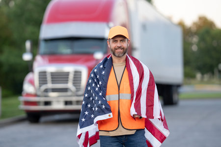 Truck drivers is a dream job in America. Truck drivers enjoy freedom and adventure on American highways. A trucking career in the USA. Truck driver living the dream of cross country travel.の写真素材