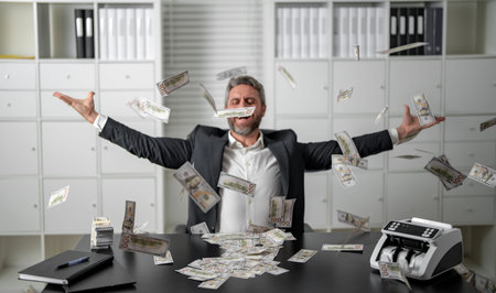 Businessman throw money. Excited male with dollar bills in hand. Wealthy businessman showing...