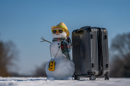 Winter gift from Snowman. Winter sale concept. Christmas and New Year celebration. Winter holiday scene. Winter delivery service.の写真素材