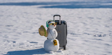 Winter gift from Snowman. Winter sale concept. Christmas and New Year celebration. Winter holiday scene. Winter delivery service. Tourism and preparing for travel.の写真素材