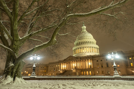 Washington DC in night winter. American Capitol Building in snow. Washington city Capitol. United States Capital. USA landmark. Supreme Court. Washington D.C. Washington city.の写真素材