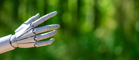 Robot hand. Robot touching concept on green nature background. Ai hand connection. Robotic hands...