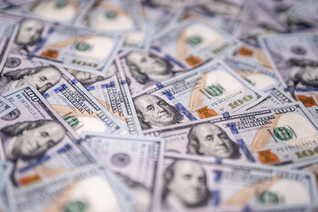 Money background with dollar cash bills. Texture of US cash. 100 USD banknotes in cash. American...