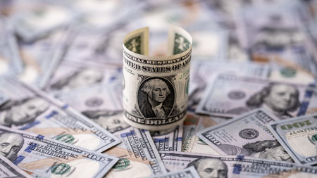 Money background one-dollar and hundred-dollar bills. US currency and money concept. 1 USD and 100 USD notes. Finance and dollars concept. American dollars money pattern. Cash and dollars savings.の写真素材