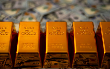 Background with gold. Finance background with golden metal and currency. Gold bars and deposit....
