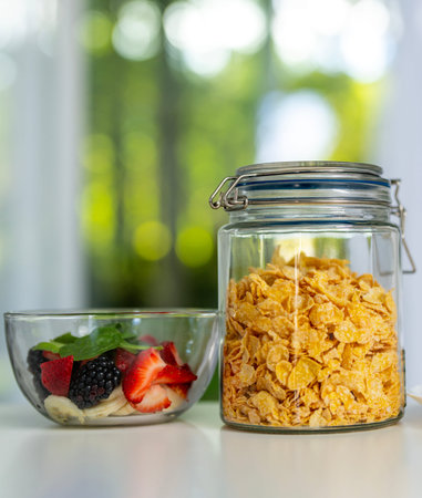 Fresh muesli with yogurt, fruit, and berries for healthy eating. Healthy meal with natural...