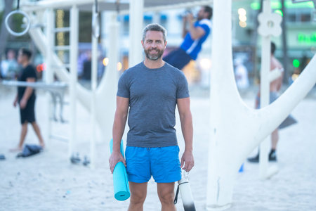Outdoor fitness training outside. Fit training in public park. Workout outside. Fit workout...
