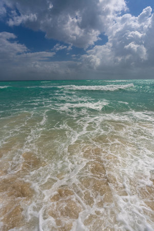 Crystal-clear sea beach water. Luxury sea beach resort. Beautiful sea beach sunset. Calm sea beach seascape. Idyllic summer paradise.の写真素材