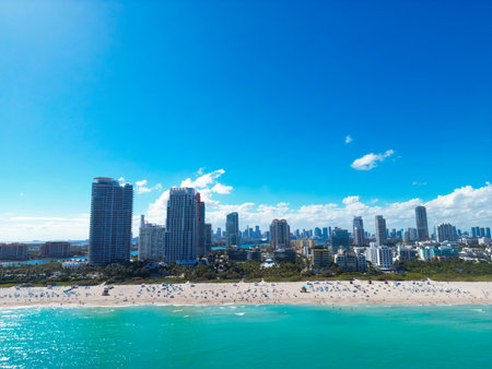 Miami under the summer sky with clouds. South beach coastal in Miami. Skyscrapers in Miami, aerial panorama. Travel dreams in Florida. Miami cityscape.の写真素材