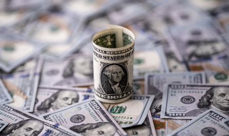 Money background with one-dollar and hundred-dollar bills. US currency and banknotes. 1 USD and 100 USD notes for finance concept. American dollars money pattern. Savings background with cash.の写真素材