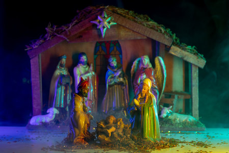 Bethlehem. Christmas decorative creche with Holy family. A Christmas scene with baby Jesus, Mary and Joseph in the manger. Bethlehem. Christian religious.の写真素材