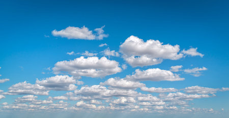 Calm sky and open atmosphere. Space for text layer background design. Panorama of sky with clouds on...