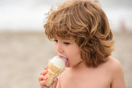 Kid eating ice-cream.の写真素材